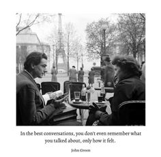 two people sitting at a table with a book in front of them and the caption reads, in the best conversations, you don't even remember what you