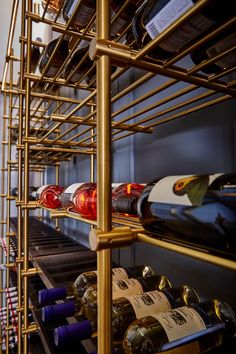 a wine rack filled with lots of bottles