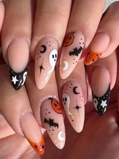 Spookify your nails for Halloween with these awesome Halloween nail art ideasFrom creepy eyes to awesome batshere are some cool ideas to inspire you. Holloween Nails Almond, Aesthetic Nails Halloween, Cute Spooky Halloween Nails, Nail Ideas Acrylic Halloween, Halloween Autumn Nails, Halloween Nails With Stickers, Nail For Halloween, Cute Nails Acrylic Halloween, Cute Halloween Nails Almond Shape