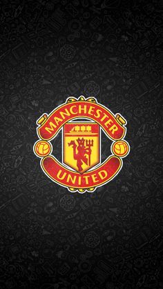 the manchester united logo on a black background