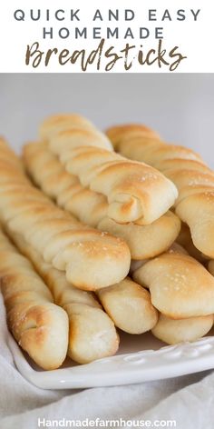 breadsticks on a white plate with text overlay