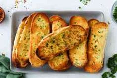 bread with herbs and seasoning on a plate