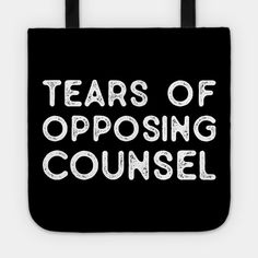 a black tote bag with white letters that says tears of opposing council on it