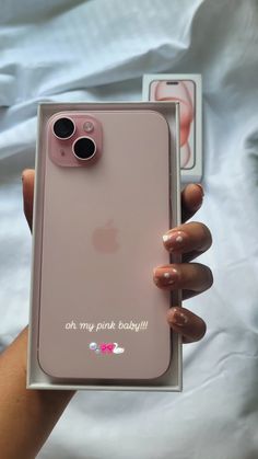 someone holding up their pink iphone case with the words, oh my pink baby on it