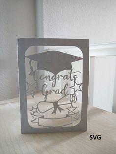 a graduation card with the words congrat grad on it