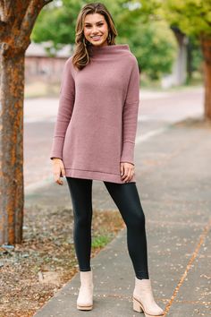 This wide mock neck tunic is the exact point at which style and comfort meet! The length is perfect for pairing with leggings which only adds to the comfort. We also love that you can dress this look up or down by pairing with boots/booties or sneakers depending on what your day looks like!  Wide mock neckline Long sleeves with drop shoulders Ribbed fabric Oversized fit Fair stretch Savannah is wearing the small. Sweater Tunic Outfit, Tunic And Leggings Outfit, Leggings Outfit Work, Tunic Sweater Outfits, Tunic Dress With Leggings, Tunic And Leggings, Dress With Leggings, Tunic Outfit, Outfit Work