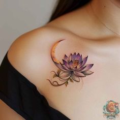 a woman's shoulder with a tattoo on it that has a purple flower and crescent moon