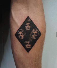 a man's leg with an image of the rolling stones on it and his face