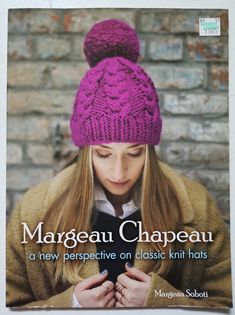 a woman wearing a purple knitted hat looking at her cell phone with the caption margau chapeau, a new perspective on classic knit hats