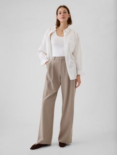 Soft, warm brushed twill trousers.  E-waist with concealed hook and bar closure, zip fly.  Front slant pockets, back welt pockets.  Pleating at front.  Fit: Classic.  An easy silhouette that fits close at the waist, and is relaxed through the hips and thigh.  Models wearing Gap Cheap Solid Color Sets For Workwear, Eboard Photoshoot, Posing Portrait, Teacher Wear, Easy Silhouette, Cool Brown, Pear Body, Pear Body Shape, Twill Trousers