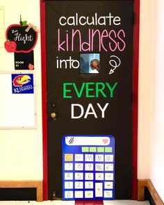 a classroom door that has a calculator on it and the words, celebrate kilnanes into every day