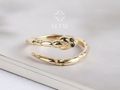 ABOUT PRODUCT This 14k Gold Snake Ring is suitable gift for girlfriend, mom and her. You can even buy as a birthday gift for your friends or anniversary gifts, If you want to add a special note we can write for you and put to inside of package. We manufacture our jewelry pieces with carefully and after production we double checking in quality control department. Our main idea is keep our items for daily wearing especially for minimalist jewelry pieces. Cute Snake animal ring. Great design tiny g Rings Snake, Serpent Jewelry, Animal Ring, Cute Snake, Zierlicher Ring, Jewelry Dainty, Main Idea, Animal Rings, Wrap Ring