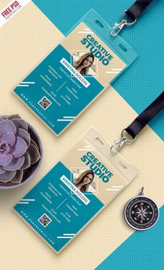 two id cards and a compass on a blue and beige background with the words creative studio