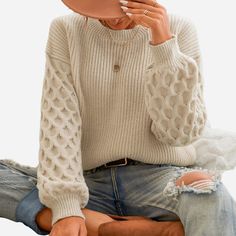 Beige Ribbed Stretch Sweater, Beige Stretch Ribbed Sweater, Cream Pointelle Knit Top For Fall, Fall Cream Pointelle Knit Top, Chic Ribbed Knit Sweater, Beige Ribbed Long Sleeve Sweater, Beige Long Sleeve Ribbed Sweater, Cream Pointelle Knit Sweater For Fall, Acrylic Pointelle Knit Long Sleeve Sweater