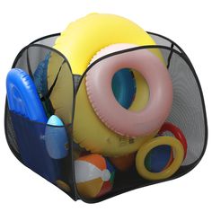 an inflatable pool toy storage bag filled with toys and beach balls on a white background