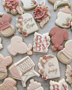 baby shower cookies are laid out on a table