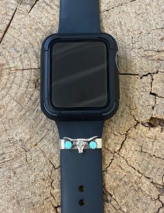 This .925 sterling silver Apple Watch slider, created by Navajo artist Elaine Perry, features a longhorn design set with 2 Kingman turquoise stones. Add a touch of western style to your Apple Watch with this unique and expertly crafted accessory. Western Watch Band, Western Apple Watch Band, Longhorn Design, Cowgirl Apple Watch Band, Bohemian Turquoise Adjustable Apple Watch Band, Turquoise Apple Watch Band, Silver Apple Watch, Silver Apple, Turquoise Stones