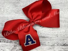 "Faux chenille initial embroidered hair bow made with grosgrain ribbon with glitter htv behind letter. Single initial faux chenille font embroidered on tail of bow.  Large and medium bows are mounted to a french style clip barrette, and small bows are on an alligator clip with teeth.  If you wish to have a headband or other style of clip, just put in note to seller.    Made to order in a smoke-free environment.  Approximate bow measurements:  Large 6\", Medium 5\", Small 4\"." Faux Chenille, Bow Measurements, Embroidered Hair Bows, Making Hair Bows, Small Bows, Monogrammed Items, Ribbon Colors, How To Make Bows, French Style