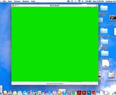 a computer screen with a green screen in the center and other screens on the left side