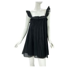 New Fendi Baby Doll Black Mini Dress Designer size 42 Black Plisse-Organza, Fully Lined in Silk, Raw Edges, Zip and Snaps Closure. Measurements: Length - 32 inches, Armpit to Armpit - 32 inches. Waist and Hips - Open. Made in Italy. New with tag. Luxury Organza Mini Dress, Luxury Black Silk Mini Dress, Luxury Black Pleated Mini Dress, Vintage Fendi Runway, 90s Runway Dresses Black, Fendi Dress, Italian Dress, Hip Openers, Silk Organza