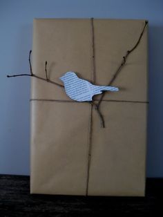 a wrapped gift with a bird on it