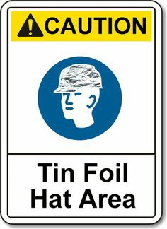 a white and blue sign that says caution tin foil hat area