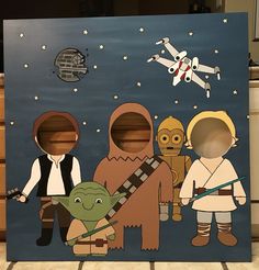 a cardboard cutout of star wars characters