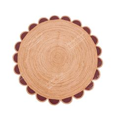 a brown and white circular rug on a white background