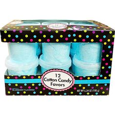 four blue cotton candy favors in a black cardboard box with colorful polka dots on it