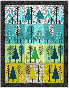 a patchwork quilt with trees on it