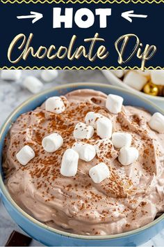 hot chocolate dip in a blue bowl with marshmallows on top