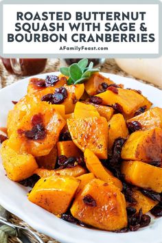 roasted butternut squash with sage and bourbon cranberries on a white platter