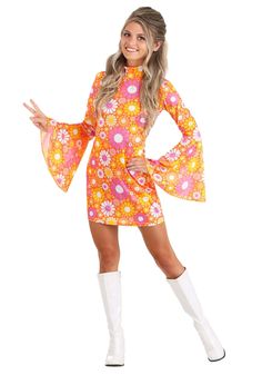 PRICES MAY VARY. Size: Small All over graphics of flowers Boots sold separately Poly knit dress has hook and loop fastener down center back Step into a world of vibrant colors and psychedelic patterns with the flower costume dress, a standout outfit that's more than just a costume. This flower dress costume is a declaration of your unique style, ensuring you'll be the life of any party with its all-over floral design. Crafted from a cozy poly knit material, the flower power dress boasts a handy Movie Star Costumes For Women Hollywood, Costumes For A Song Title Theme Party, Flower Dress Costume, Costume Fleur, Hippie Costume Halloween, 70s Costume, Disco Costume, Hippie Halloween, 1970s Hippie