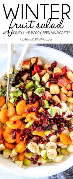 a white bowl filled with fruit salad on top of a table