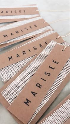 several pieces of brown paper with black words on them that say maisie and marise