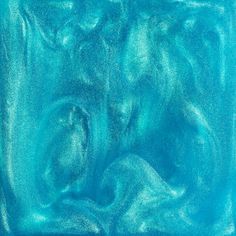 an abstract painting with blue and green hues on the bottom part of the image