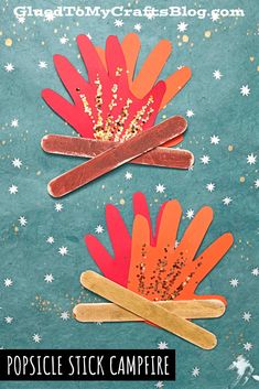 popsicle stick campfire craft for kids to make with paper and gold glitters