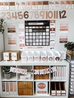 a desk with calendars and boxes on it