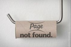 a roll of toilet paper that is hanging on a metal holder with the words page not found