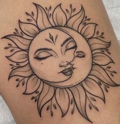 a sun tattoo with a face on it