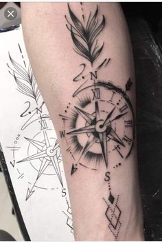 a black and white photo of a clock with feathers on it's arm, done by person