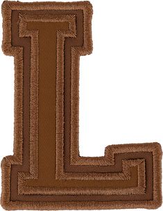 the letter l is made up of brown fabric and has an interlocked design