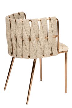 a beige chair with gold metal legs