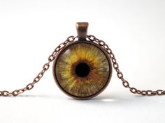 "Brown Eye Necklace Human Eyes Jewelry Eye Pendant Unique Gift Birthday Gift Eye Necklace Eyeball Realistic Eye Ophthalmologist Gift Hazel Jewelry you get in a gift box, ready for gift giving. Make a gift to yourself or your loved ones. ITEM DETAILS: - Size of pendant: 1\" (2.5cm) - Material: metal part, metal chain or key ring, lens, photo print  - Chain length you can choose in options: 18\" (45cm), 24\" (60cm) or 30\" (75cm)  - Color of the metal part you can choose in options: Silver, Vintage Silver, Black, Vintage Bronze or Copper I can do for you chain shorter, just tell me the length you want.  The product is safe for the skin, does not contain nickel and lead. I look forward to any of your questions! Have a nice day :)" Vintage Circle Necklace For Gifting, Vintage Circle Necklace For Gifts, Personalized Brown Necklace For Gift, Eyes Jewelry, Eye Accessories, Human Eyes, Realistic Eye, Custom Eyes, Brown Eye