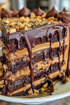 a cake with chocolate frosting and nuts on top