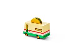 a small toy truck with a taco on top