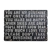 a sign that says you are my sunshine and the words on it have been written in white