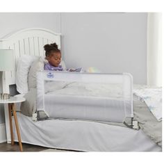 The Regalo Swing Down Bed Rail Keeps Your Child Safe As They Transition From A Crib To A Big Kid Bed. Designed With A Steel Frame And A Durable Nylon And Mesh Cover, The Bed Rail Measures 20” High And Extends To 43”. No Tools Are Required For Assembly And It Locks Into Place For Added Security. Our Patented Swing Down Feature Allows This Bedrail To Pivot Down And Out Of The Way When Getting In And Out Of Bed Or Removing Sheets Kids Bed Rails, Childrens Bed, Hideaway Bed, Bed Rails For Toddlers, Rail Guard, Big Kid Bed, Bed Rail, Queen Mattress Size, Bed Rails