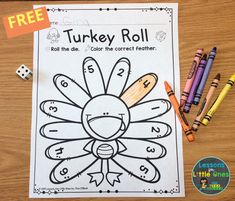 a turkey roll game with crayons and markers