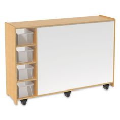 an empty whiteboard on wheels with bins